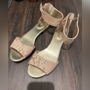 Women’s cream and snake skin sandal